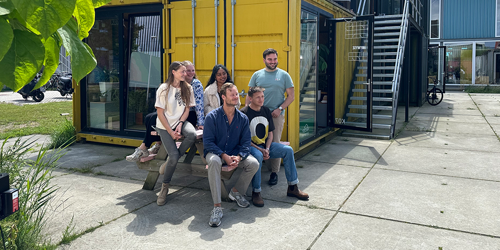 A group of people posing for a team photo